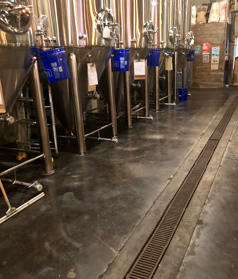NDS Dura-Slope trench drain installed in a brewery floor slab