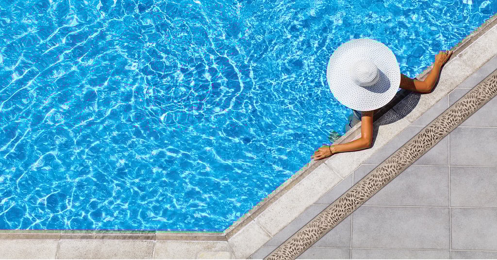 NDS Spee-D Channel installed in pool patio setting showing grate color options